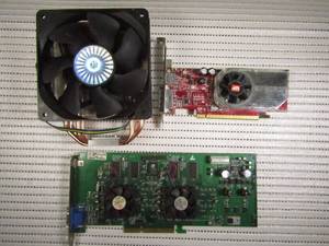lot 77 image: Cooler Master heat sink, ATI Radeon DDR3 graphics card, and AAVID graphics card