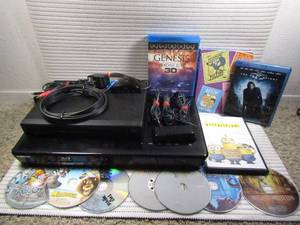 lot 83 image: 2 Blu-Ray players, Lot of different movies, and Logitech Remote RF Wireless Extender