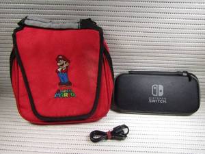 lot 86 image: Nintendo DS and Switch Lite carry cases with USB-C to USB cord
