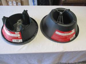 lot 56 image: 2-Holiday Time Christmas Tree Stands, 1-Express 8-Ft, and 1-Fresh Cut. Both have hardware
