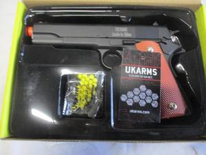 lot 70 image: NIB-V-14 Air Soft Spring Powered Pistol