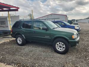 lot 1 image: 2002 Isuzu Rodeo - Vin# 4S2CK58W724310420 - Engine light is on - Come and Preview - NO TITLE - Buyer will need to apply for lost or Bonded title. - SOLD AS IS