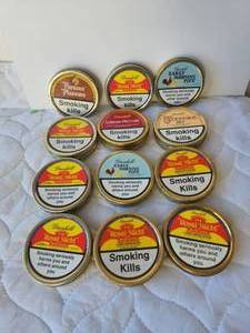 lot 17 image: Selection of empty pipe tobacco cans