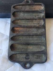 lot 56 image: Vintage mini - cast iron corn muffin pan