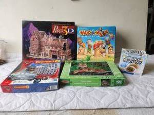 lot 144 image: Selection of puzzles and games