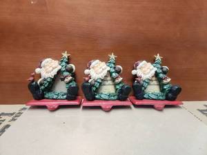 lot 243 image: Selection of 3 Santa stocking holders