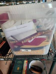 lot 227 image: Bin of material and sewing items