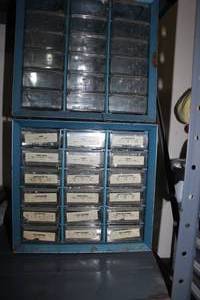 lot 25 image: Two Small drawer storage bins, one is empty, the other has nuts and bolts included