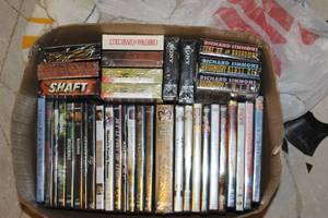 lot 128 image: New Still in Plastic Wrapping DVDs and VHS