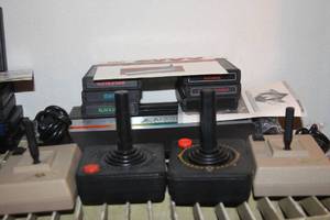 lot 159 image: Atari 2600 Jr. with 2 Sets of Controllers and Games as shown in pictures