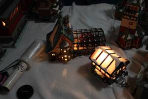 lot 203 image: Vintage Studio 56 Hand Painted Porcelain Christmas Village Pieces, Green Houses