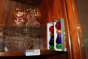 lot 282 image: Clear Glass Plate Stand, Bowls, New Salt and Pepper Shakers, olive fork and Brass Reindeer napkin rings