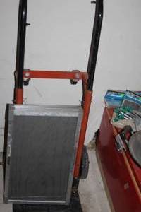 lot 165 image: A Four wheeled Dollycart and 3 Size adjustable Window Screens