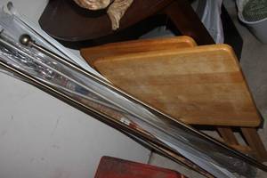 lot 169 image: Two Wooden TV Trays and a quantity of Curtain Rods as shown in pictures