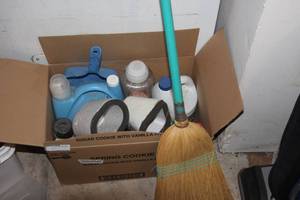 lot 180 image: Cleaning supplies and outside water faucet covers as shown