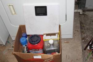 lot 179 image: Laundry room supplies, scales, detergent and other cleaning products as shown