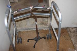lot 182 image: Push walker and walking cane