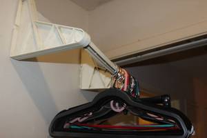 lot 74 image: Over the Door Rack and Hangers See Photos