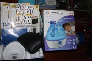 lot 267 image: Blood sugar Tester with some Strips, Humidifier and Biggest Loser DietingCookBooks