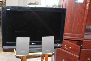 lot 304 image: Tv and Speakers