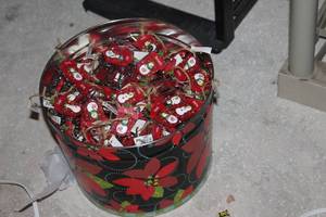 lot 328 image: Bucket Full of Christmas Orgnment Sleighs with Names on them