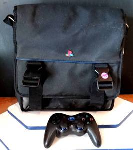 lot 145 image: PLAYSTATION GAME BAG AND CONTROLLER