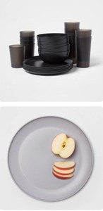 lot 79 image: Lot of 44 - New Room Essentials Dinnerware - (24) 10.5 Plastic Dinner Plates - Gray & 20pc Plastic Dinnerware Set - Black