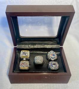 lot 5 image: 5 Championship rings in Wooden Box Cowboys, Broncos, Royals, Panthers and Patriots