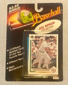 lot 18 image: Cal Ripken Collection #1313 12 Cards, various years sealed & unopened
