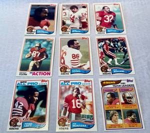 lot 31 image: San Francisco 49ers Football Cards including Joe Montana and Ronnie Lott (9 total)