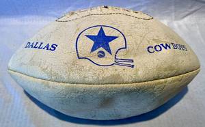 lot 47 image: Vintage 1970s Dallas Cowboys Football with faded signatures Charlie Waters 41 is easily seen