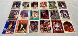 lot 62 image: 18 NBA Cards including Earvin Johnson & Dekembe Motombo