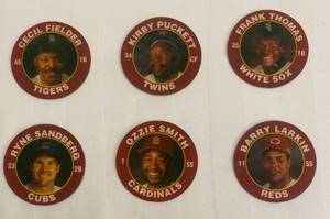 lot 101 image: 1992 7-11 Slurpee Coin Disks including Barry Larkin and Ozzie Smith
