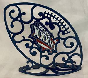 lot 155 image: Blue Super Bowl XXXVI Metal Football with scroll design Decorative Table Topper