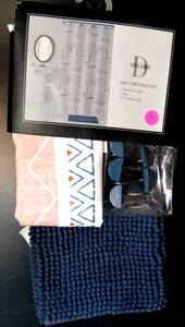lot 13 image: NEWSEALED - STUDIO D MULTI PIECE BATH SET - CURTAIN, RUG, AND HANGING RINGS