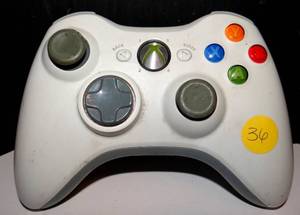 lot 36 image: XBOX GAMING CONTROL AS SHOWN