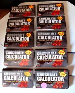 lot 61 image: UNIQUE FUN LOT OF 10 - CHOCOLATE CALCULATORS - LOOKS & SMELLS LIKE CHOCOLATE BAR
