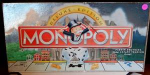 lot 79 image: MONOPOLY DELUXE EDITION