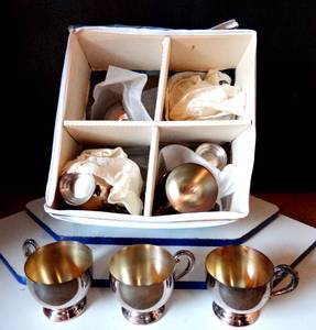 lot 204 image: LOT OF 12 - STERLING SILVER PLATE CUPS IN STORAGE BOX