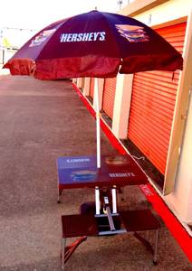 lot 219 image: AWESOME HERSHEYS CHOCOALTE PORTABLE PICNIC TABLE WITH FOLD OUT CHAIRS, UMBRELLA AND UMBRELLA STAND $$$
