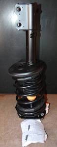 lot 220 image: NEW Leacree 2462125102 Suspension Strut And Coil Spring Assembly $$$