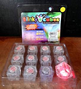 lot 222 image: BLINKY CUBES - SET OF 12 RED FLASHING NOVELTY ICE CUBES (WATERPROOF)