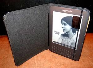lot 293 image: Kindle D00901 6 Wireless Reading Device in Case wQuick Start Guide