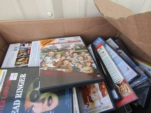 lot 29 image: Box of DVD movies used qty 20 plus, horror, kids, funny, love story movies and many more