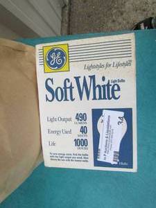 lot 34 image: Small brown bag full of various light and lamp bulbs