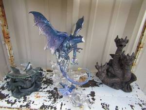 lot 45 image: Various dragon art pieces, some have small damage, purple glass dragon head is broke but comes with the piece