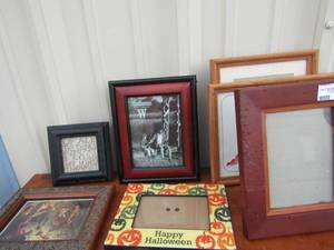 lot 52 image: Various New 810 photo frames, mostly wooden, 1 Happy Halloween frame