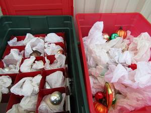 lot 58 image: 2 red tubs full of various vintage Christmas ornaments such as, Animals and fruit   x $