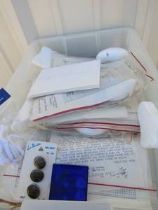 lot 63 image: Copper parchment paper new in a 3 drawer storage shelf, various color and stitch Christmas cards