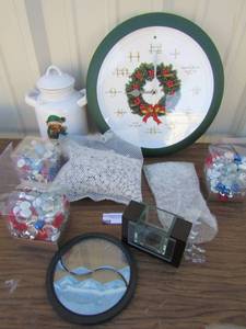 lot 66 image: Christmas oval wall clock needs batteries, covered Christmas cookie jar, various beads for dcor and stones